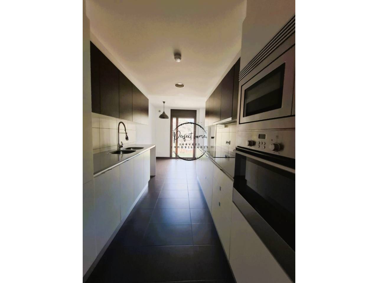 FABULOSO PISO EN VENTA CON JARDÍN EN ORDINO
