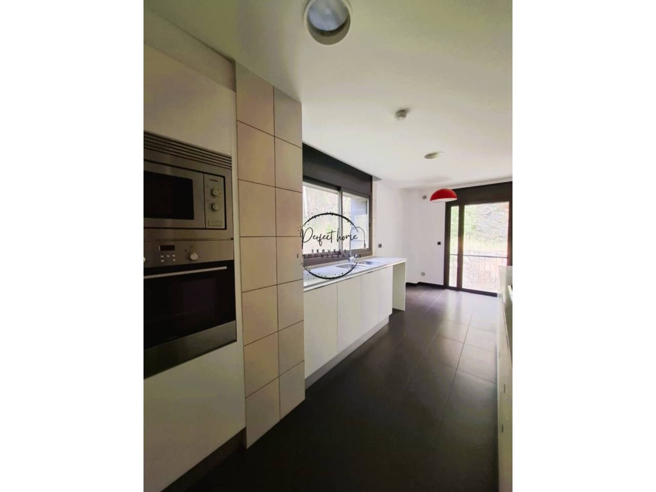 FABULOSO PISO EN VENTA CON JARDÍN EN ORDINO