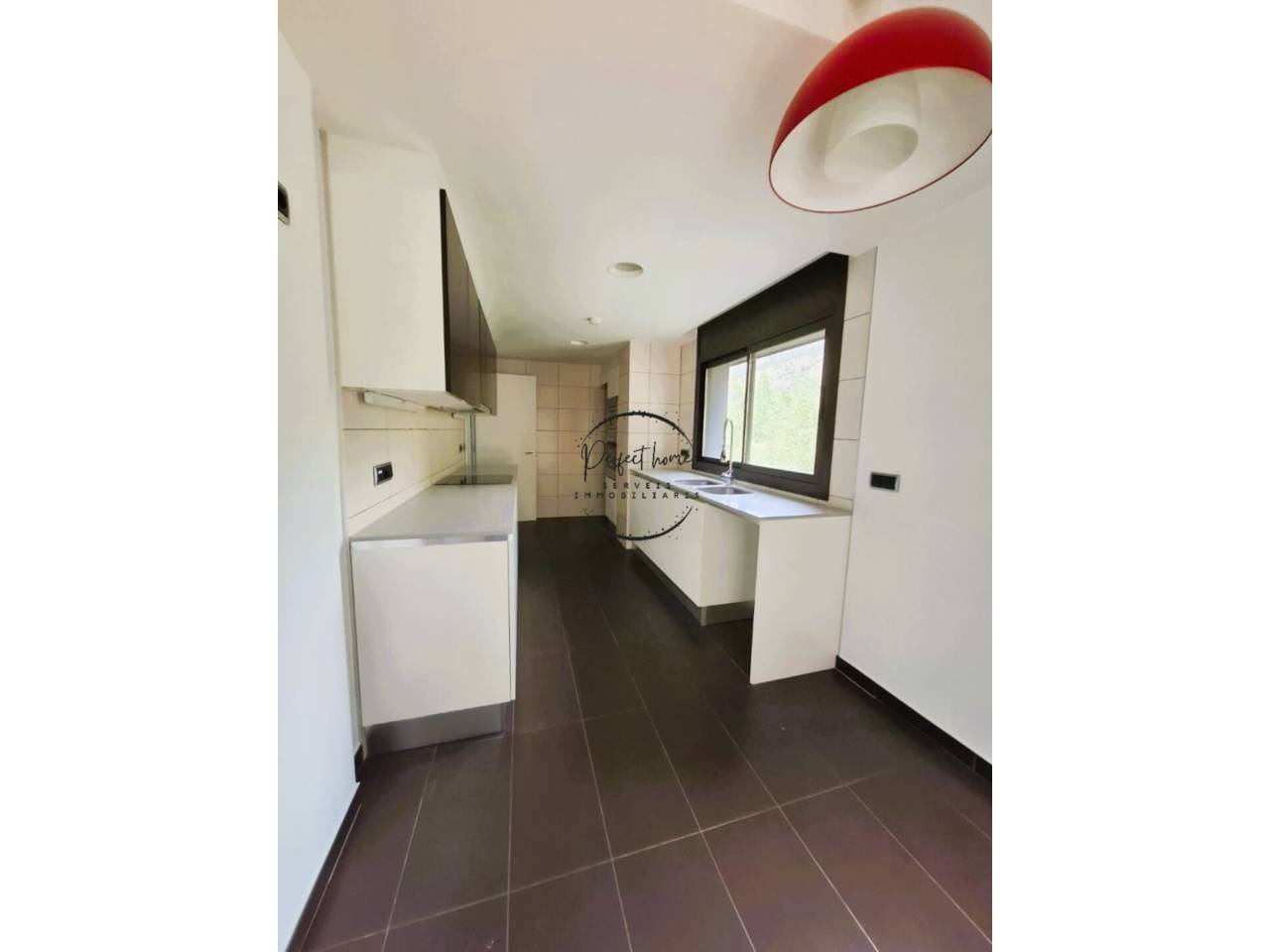 FABULOSO PISO EN VENTA CON JARDÍN EN ORDINO