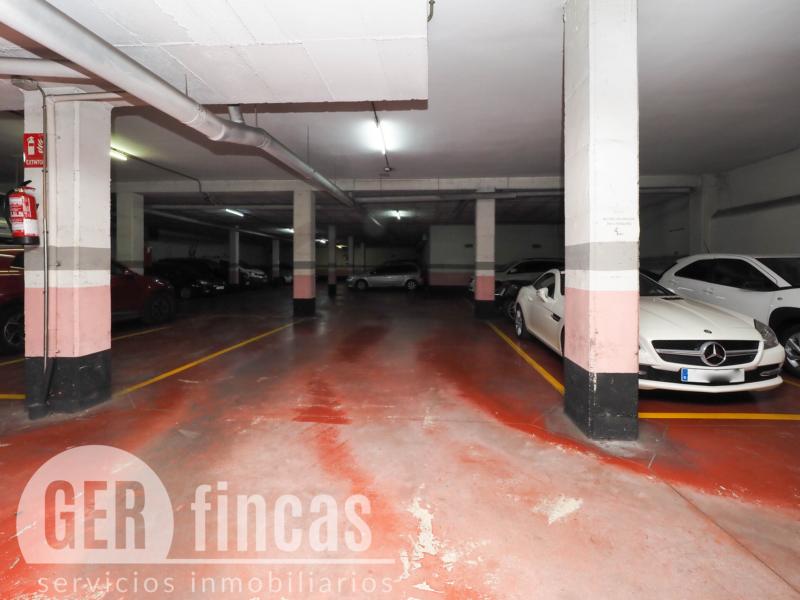 Plaza de parking cerrada de 20 m² con sistema de seguridad · Garaje/Parking