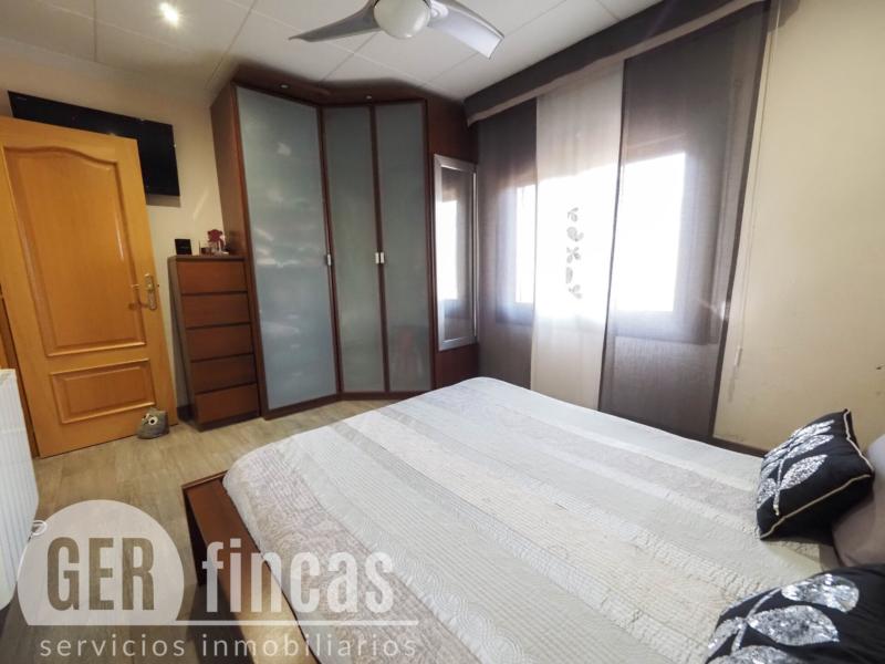 Casa de cuatro vientos con jardín y planta superior diáfana · Dormitorio