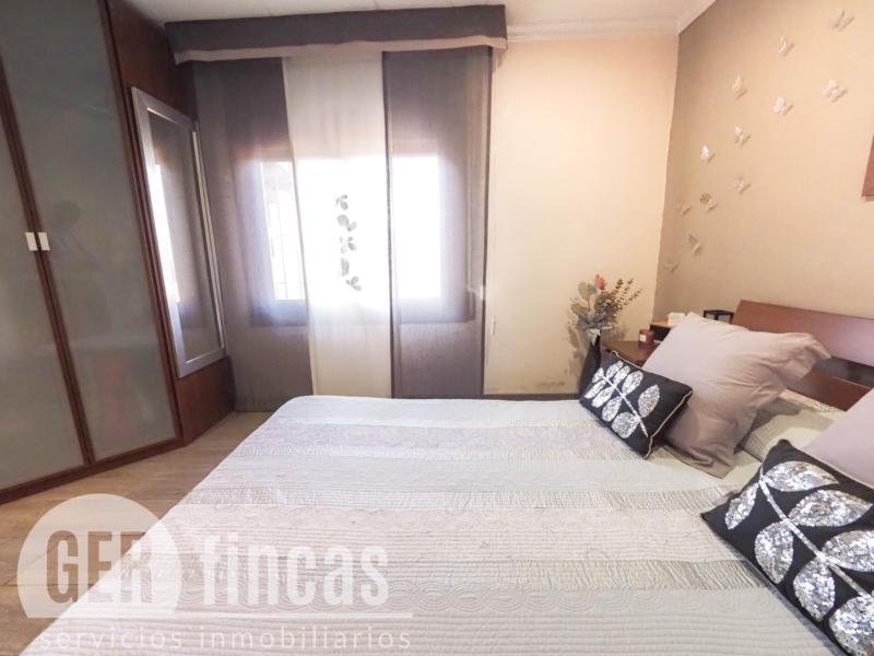 Casa de cuatro vientos con jardín y planta superior diáfana · Dormitorio