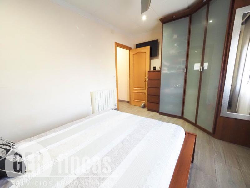 Casa de cuatro vientos con jardín y planta superior diáfana · Dormitorio