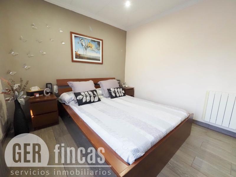 Casa de cuatro vientos con jardín y planta superior diáfana · Dormitorio