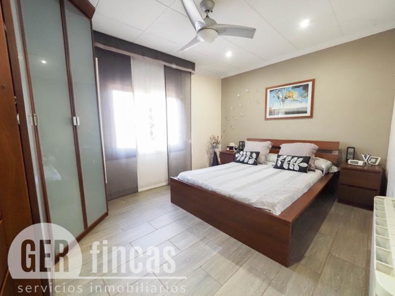 Casa de cuatro vientos con jardín y planta superior diáfana · Dormitorio