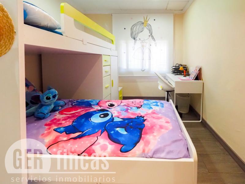 Casa de cuatro vientos con jardín y planta superior diáfana · Dormitorio