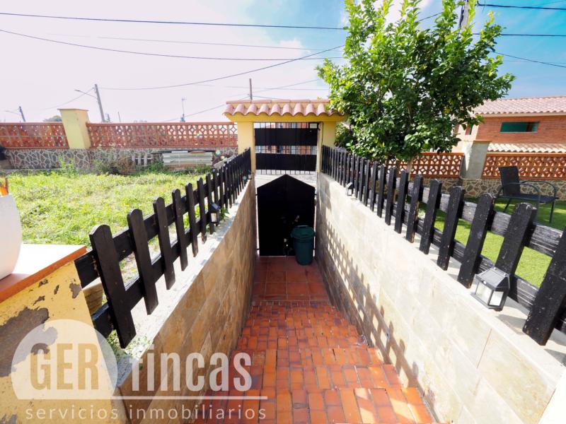 Casa de cuatro vientos con jardín y planta superior diáfana · Terraza