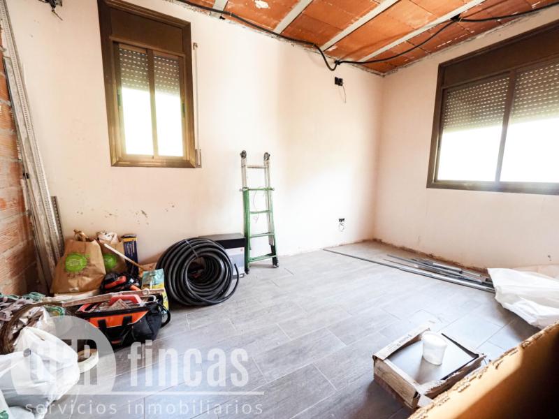 Casa de cuatro vientos con jardín y planta superior diáfana · Dormitorio